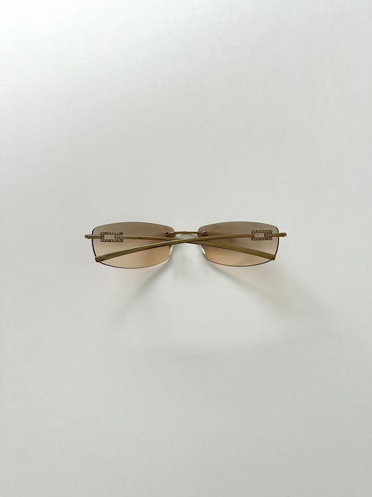 Gucci Rimless Rhinestone Logo Sunglasses